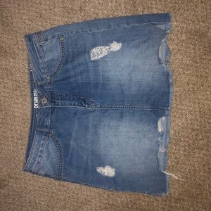 Distressed denim mini skirt